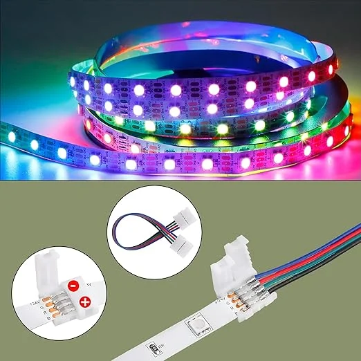 LED strip light connector with sharp pins and protective plastic covering, two coloured wires visible.