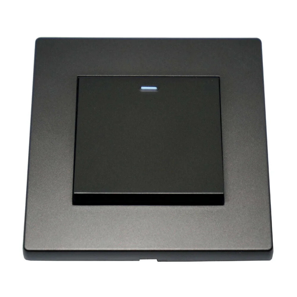 Screwless 3 gang light switch in brushed gold, showing three buttons on a compact wall mounting unit.