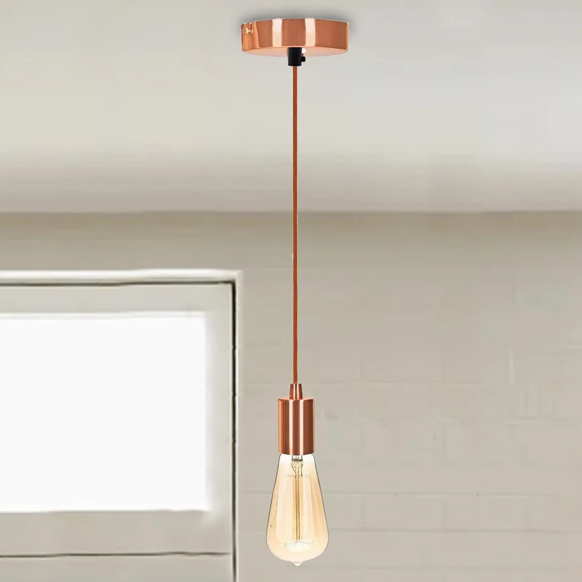 Stylish rose gold E27 pendant lamp with braided fabric flex, metal base and PVC wire, hanging from 120mm ceiling plate