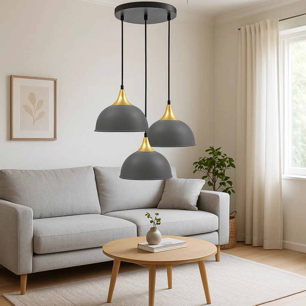 Three‑light industrial pendant light with grey metal domes and yellow brass base, hung on a 95 cm cable.