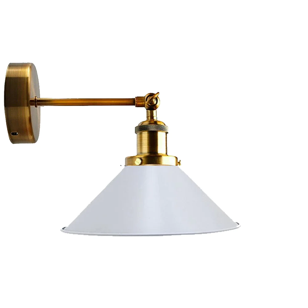 Kitchen wall light with yellow brass base and white cone shade, vintage style, mounted on wall arm