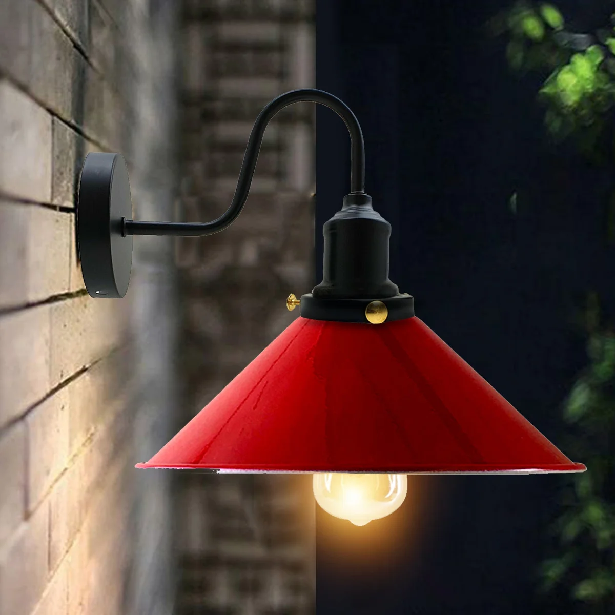 Red vintage industrial wall light with cone metal shade and swan neck arm, mounted on wall.