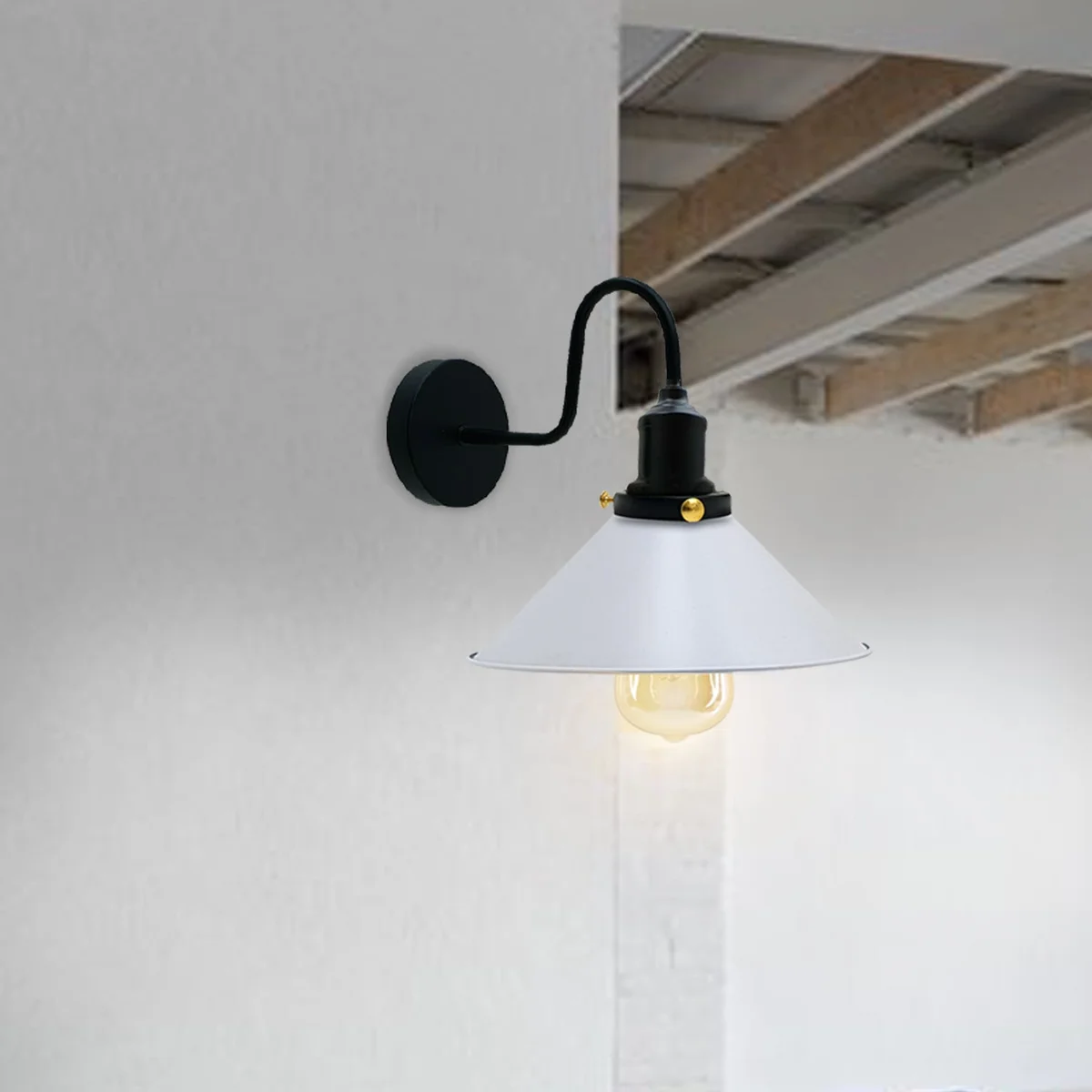 White metal cone-shaped vintage wall sconce with swan neck arm, industrial rustic design on a wall.