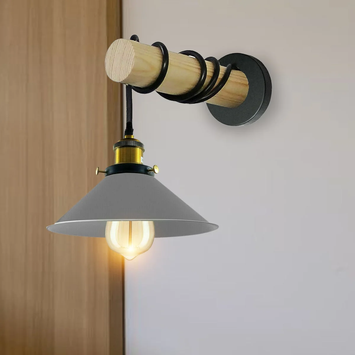 Solid wood wall light with grey cone-shaped metal shade, arched wooden arm, glowing interior.