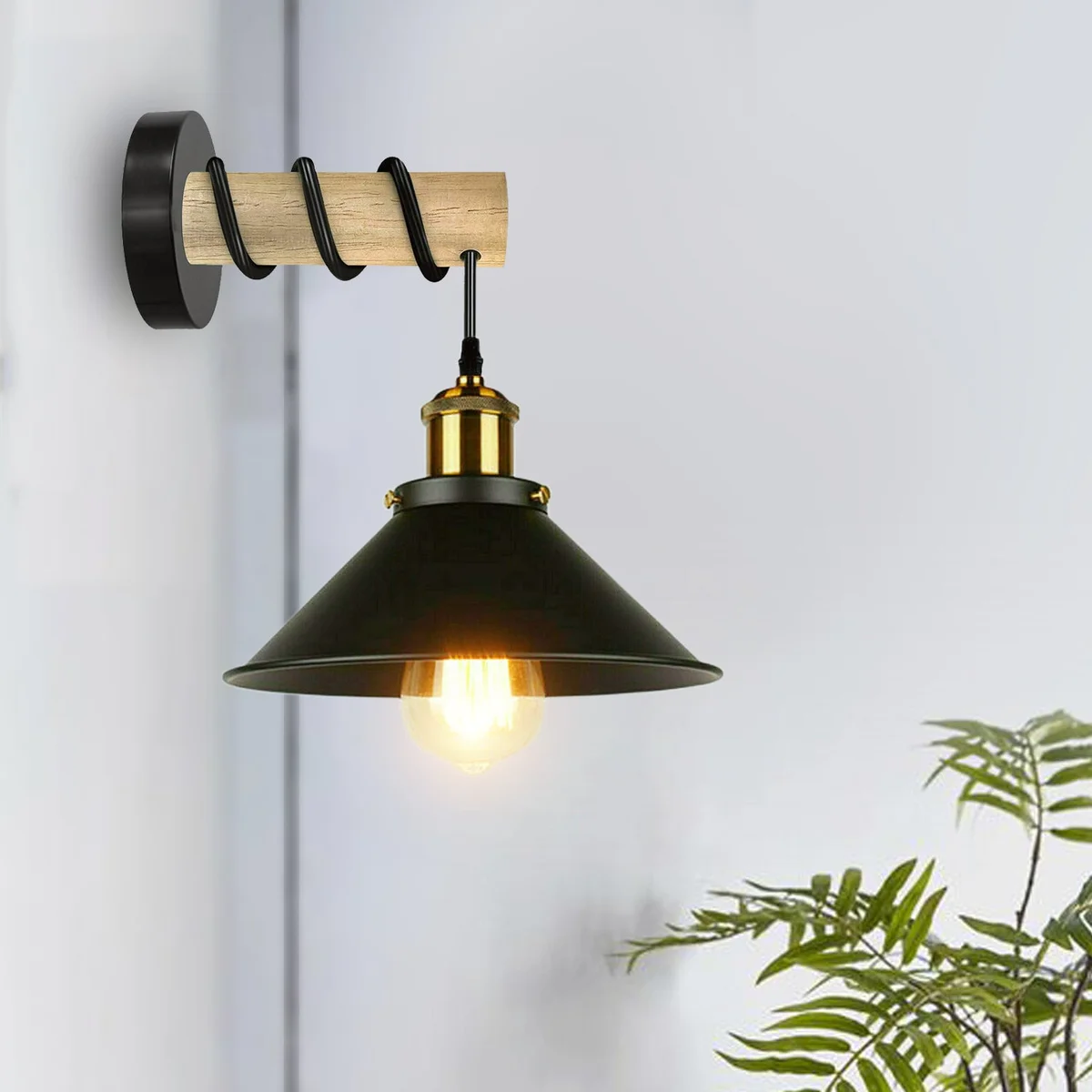 Modern wooden wall light with black metal cone shade on wooden arm, stylish rustic design mounted on wall.