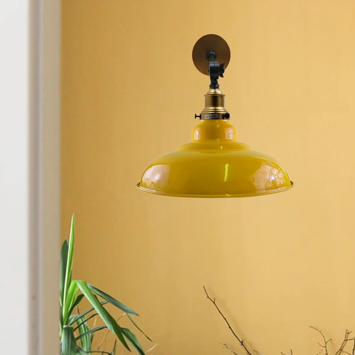 Yellow wall light with 32 cm metal shade, curvy swing arm, glossy yellow finish.