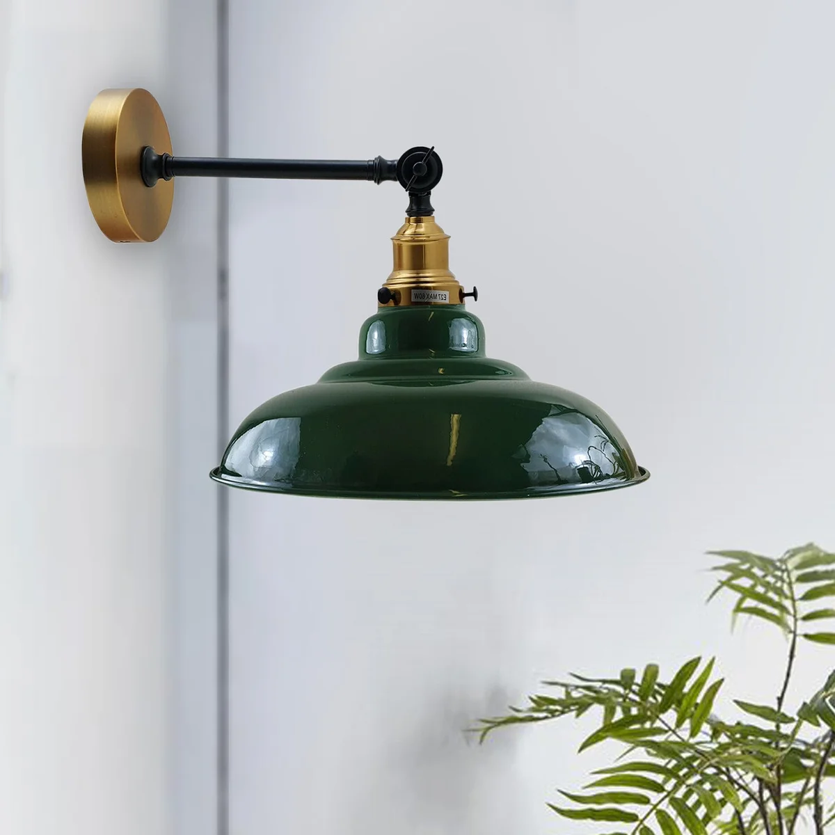 Adjustable wall lamp with 32 cm green curved metal shade, swing arm, industrial style.