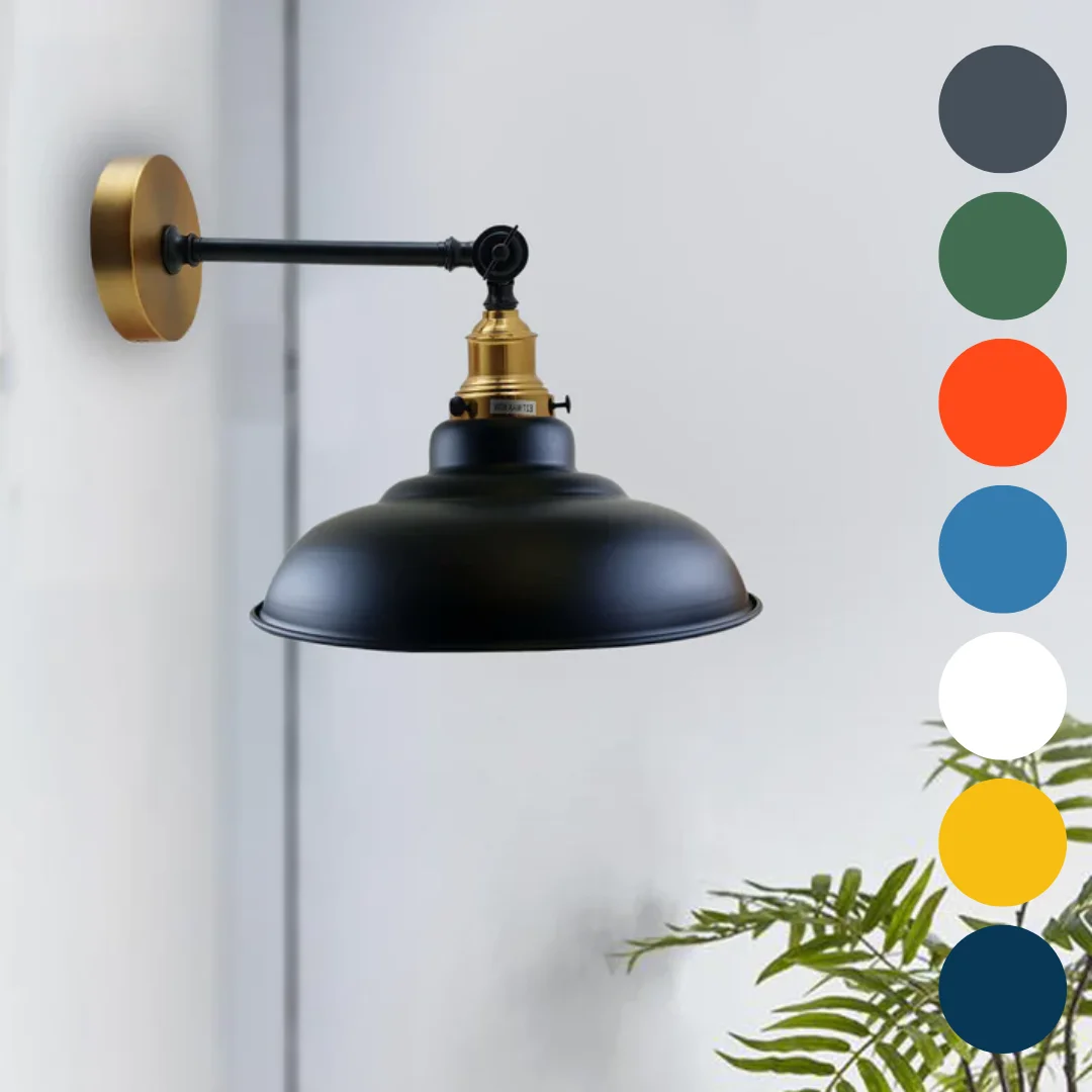 Adjustable vintage wall light with curved metal shade, Edison bulb, hanging on wall – stylish industrial lighting.