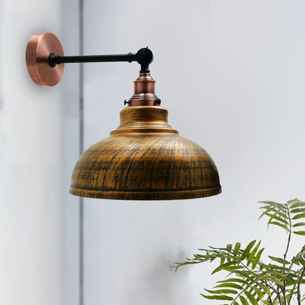 Dome wall lamp with brushed copper metal shade, curvy dome design, adjustable arm and ceiling rose fitting