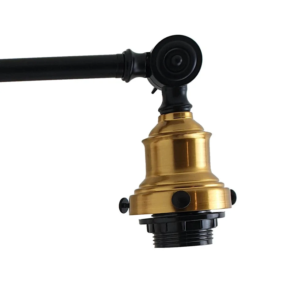 Brushed brass adjustable wall light with a curved dome shade, thickened metal body, and extendable arm for lighting.