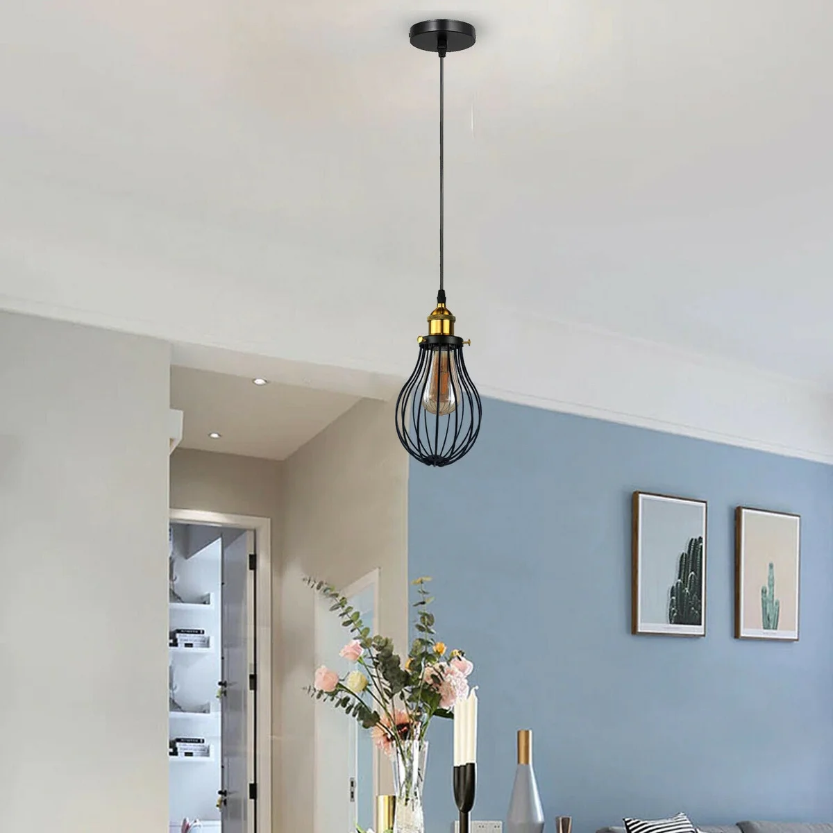 Black metal cage vintage pendant lighting with round base, dimmable E27 socket, hanging cable, over kitchen island