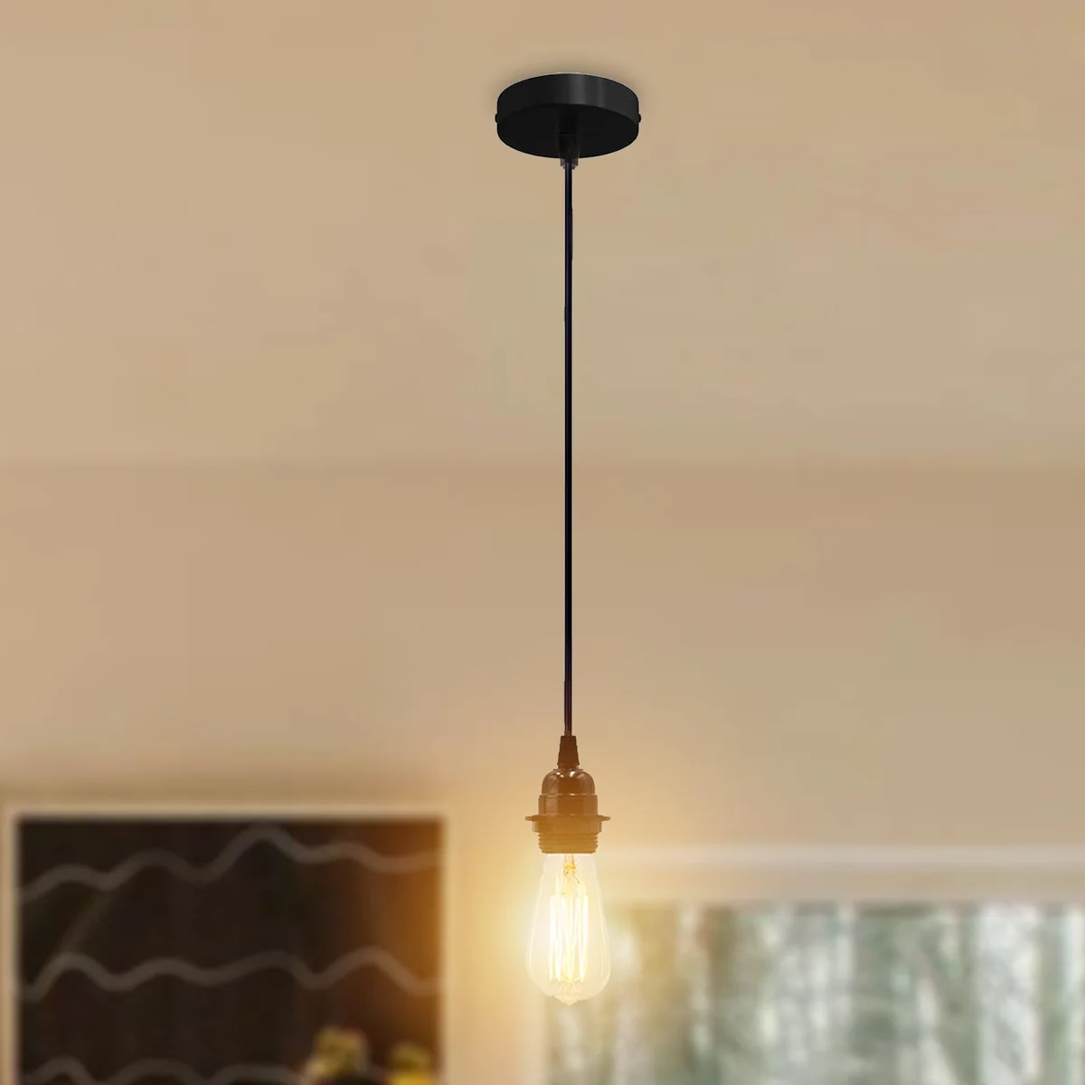 E27 ceiling pendant light featuring a 12cm metal rose, black 90cm cord and steel housing