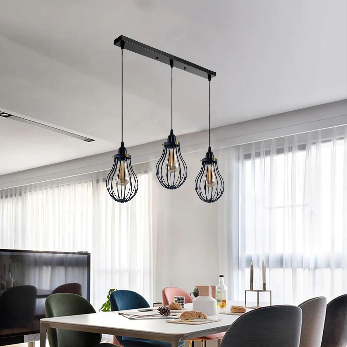 3‑head black metal pendant light with cage design, adjustable 95 cm cables, black metal shade.