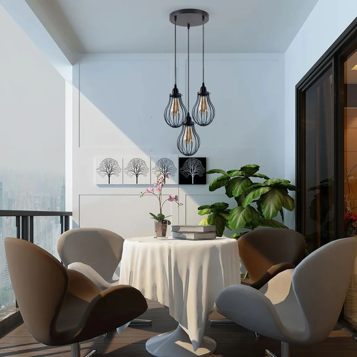 Black cage pendant light with three adjustable PVC cables and metal cage shade hanging from ceiling, industrial retro design.