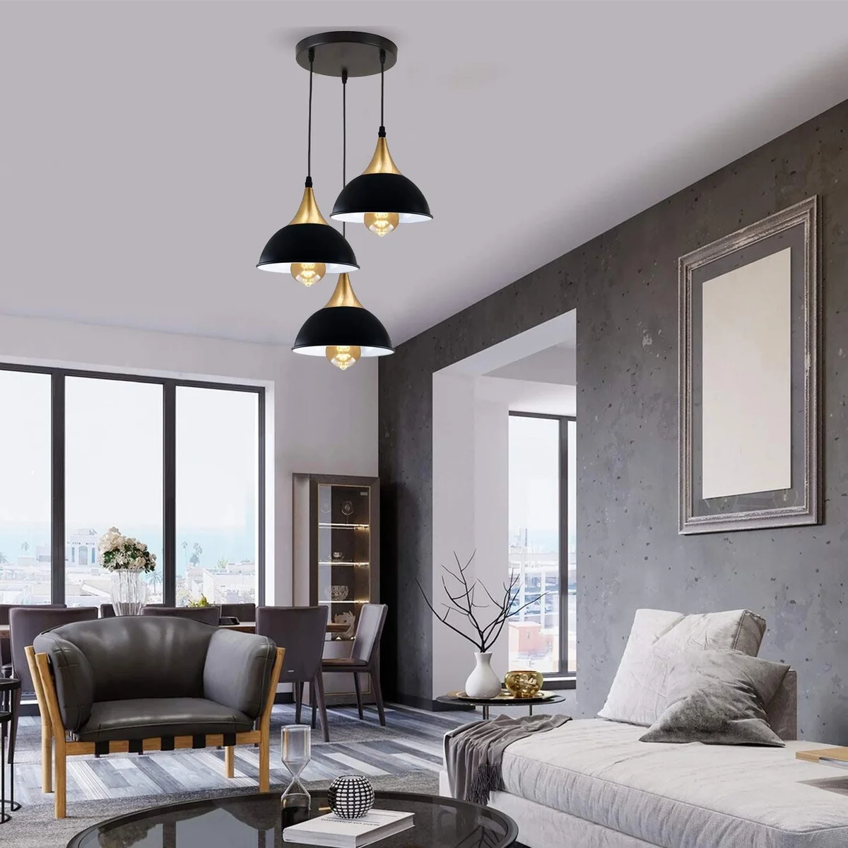 3 head pendant light with black dome shade, modern sleek metal frame, hanging from ceiling with long PVC cable.