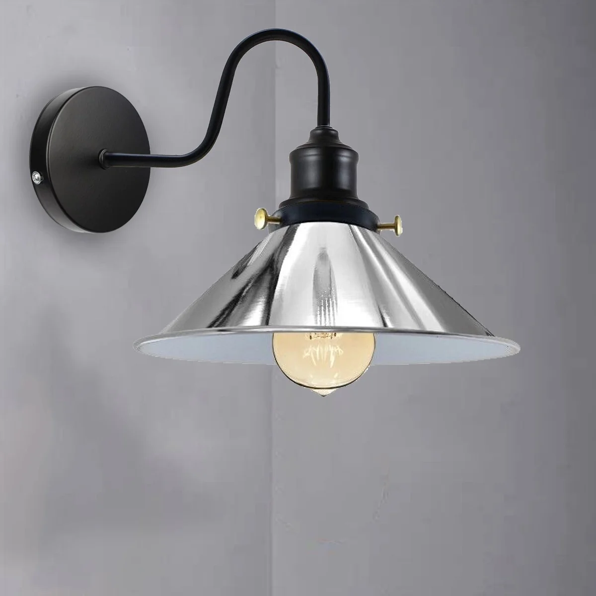 Vintage industrial wall light with swan neck arm, metal shade and E27 base.