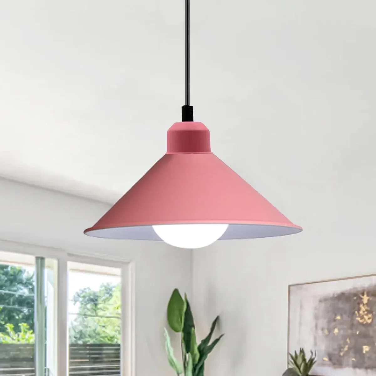 Retro pink metal pendant light with pink shade hanging from ceiling via 95cm cable, ideal for bedrooms and living spaces