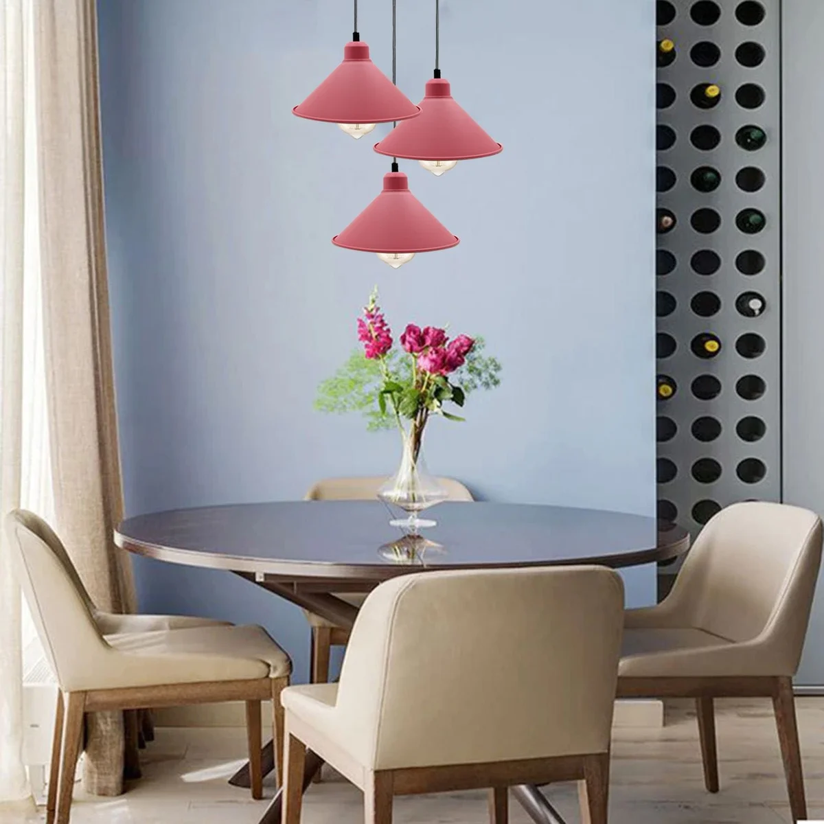 Pink ceiling light with retro metal pendant shade hanging from a ceiling canopy, adjustable cord displays soft pastel finish