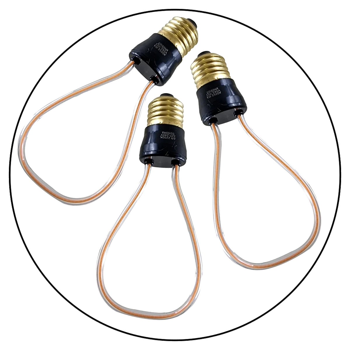 Three warm‑yellow vintage LED bulbs with a curvy filament on a glass housing, showing a classic industrial style.