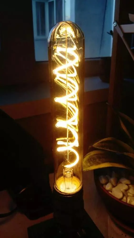 Three warm white retro LED bulbs with curly heart‑shaped filament, glass casing, 4W E27 long life LED bulbs.