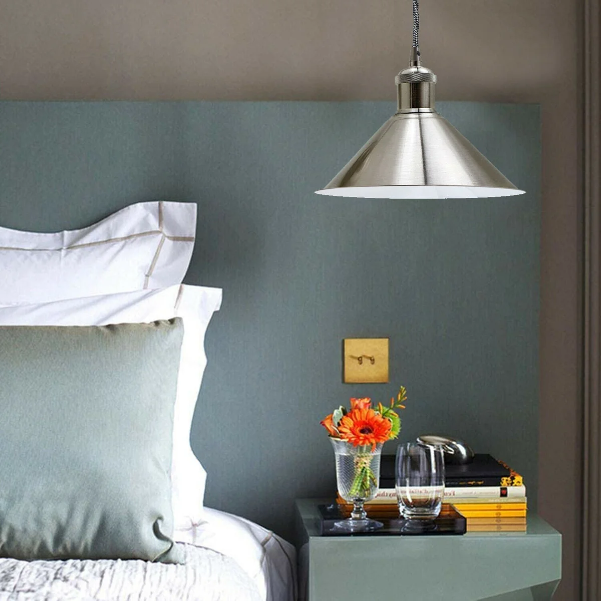 Industrial metal pendant light hanging from ceiling, matte‑satin nickel iron lamp shade, single E27 holder, vintage loft style.