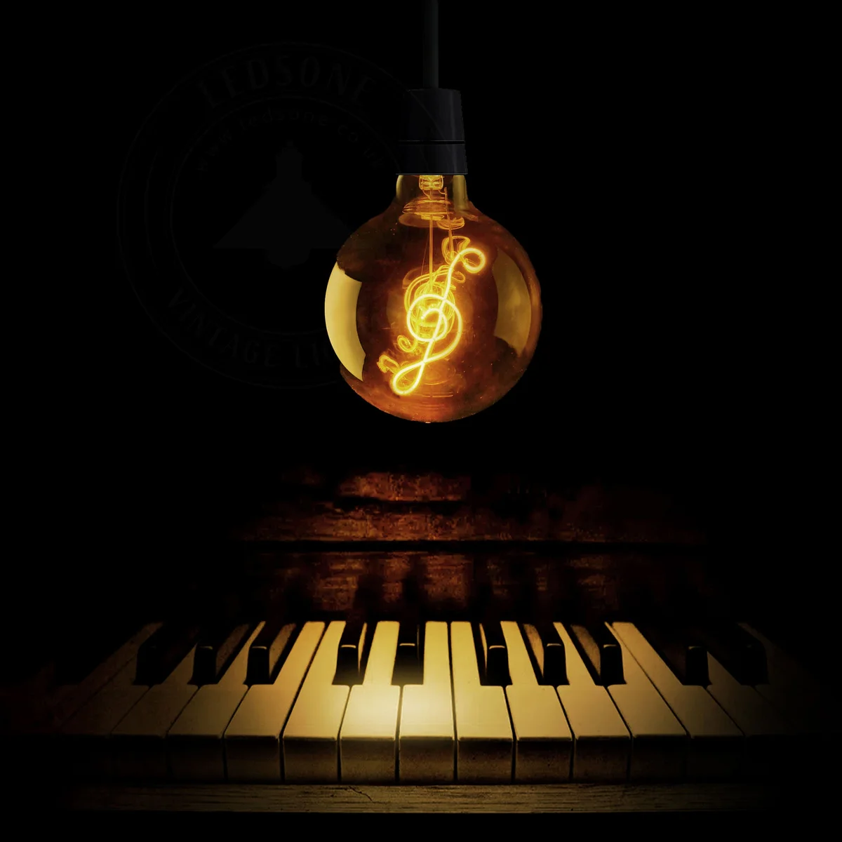 Vintage LED bulb featuring curly filament heart shape in warm white, Edison screw base, glows softly