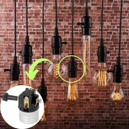 Two‑circuit lamp socket with removable turn knob on medium E26 base, metal shell, incandescent holder.
