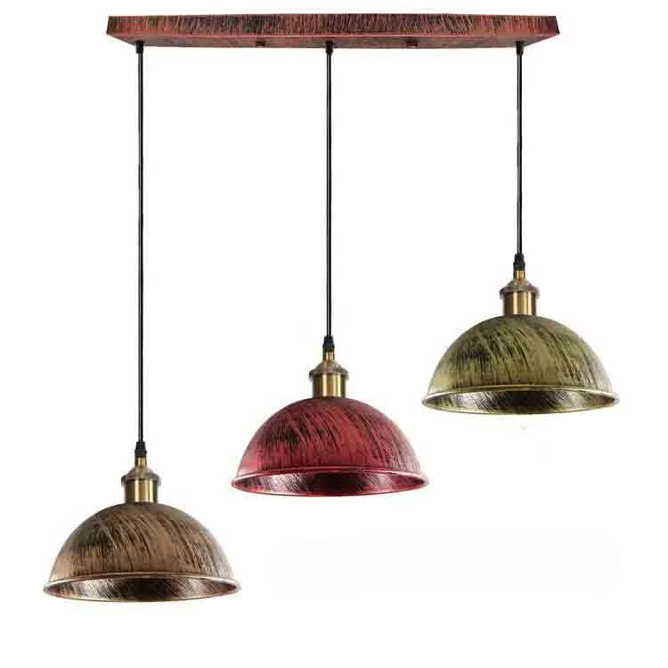 Rustic red pendant lamp cluster of three metal holders with 95 cm PVC cable and ceiling plate, mounted for warm ambience.