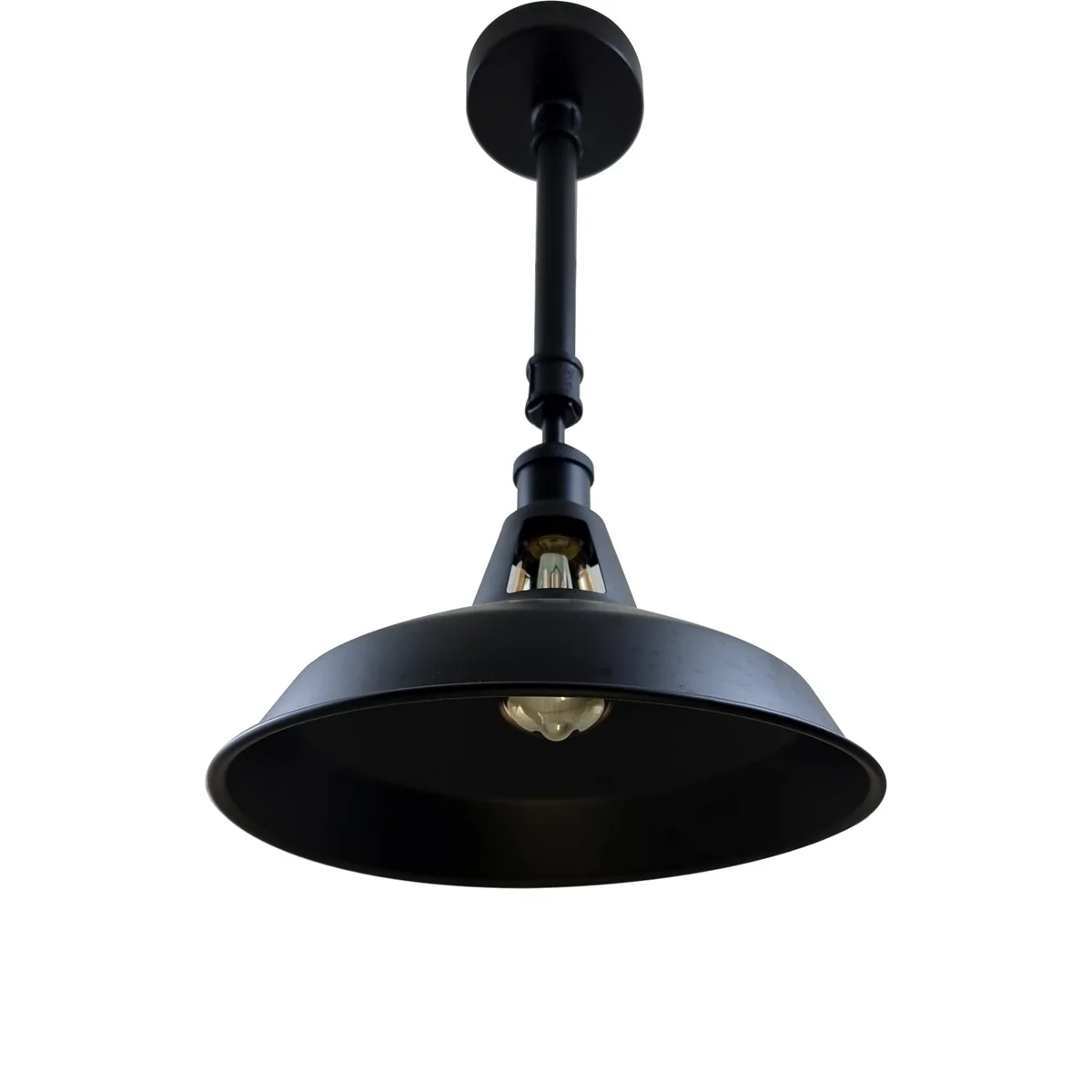 Black metal ceiling light fixture in industrial style, round iron shade with E27 socket visible.