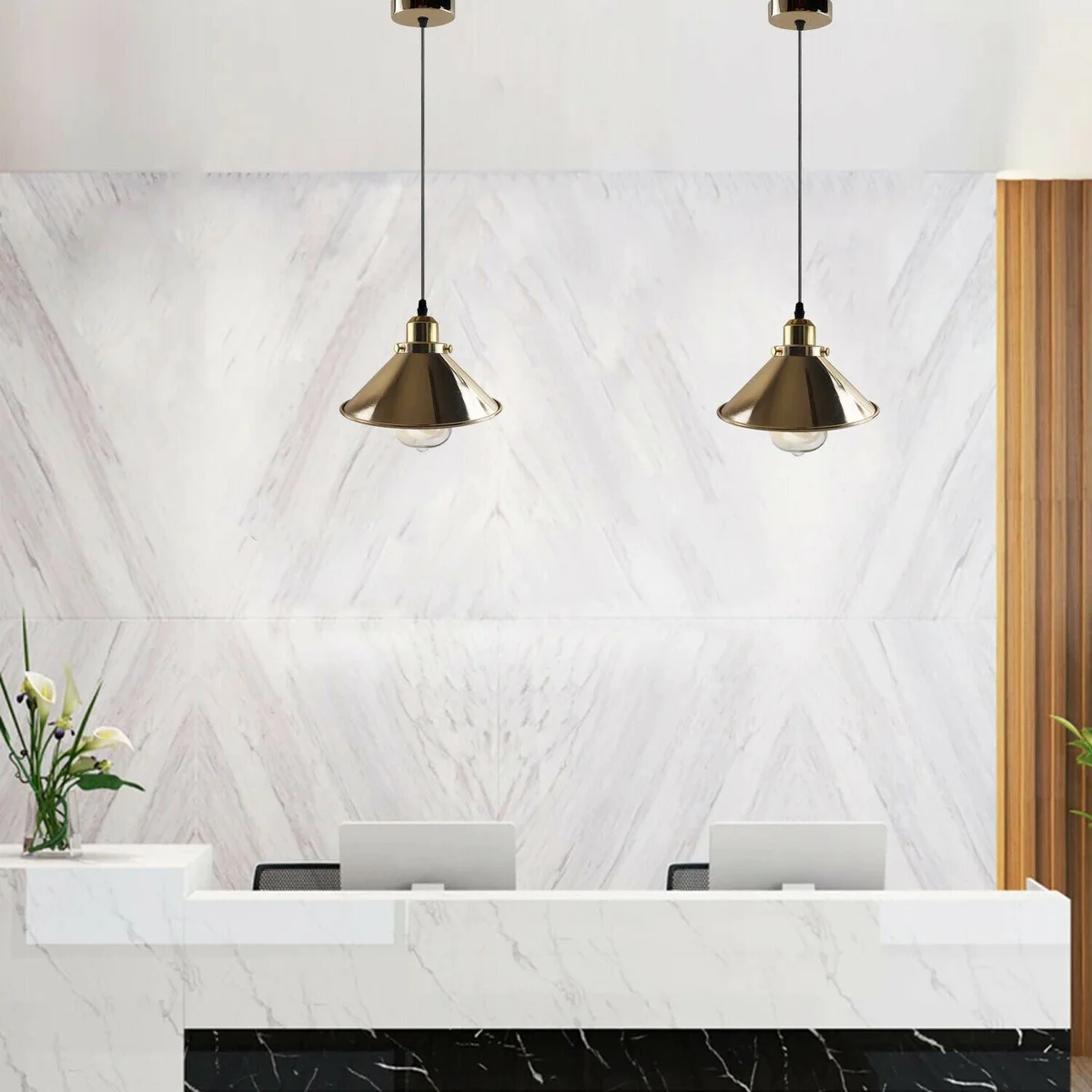French gold pendant light with cone metal shade hanging from ceiling, industrial style, PVC cord visible