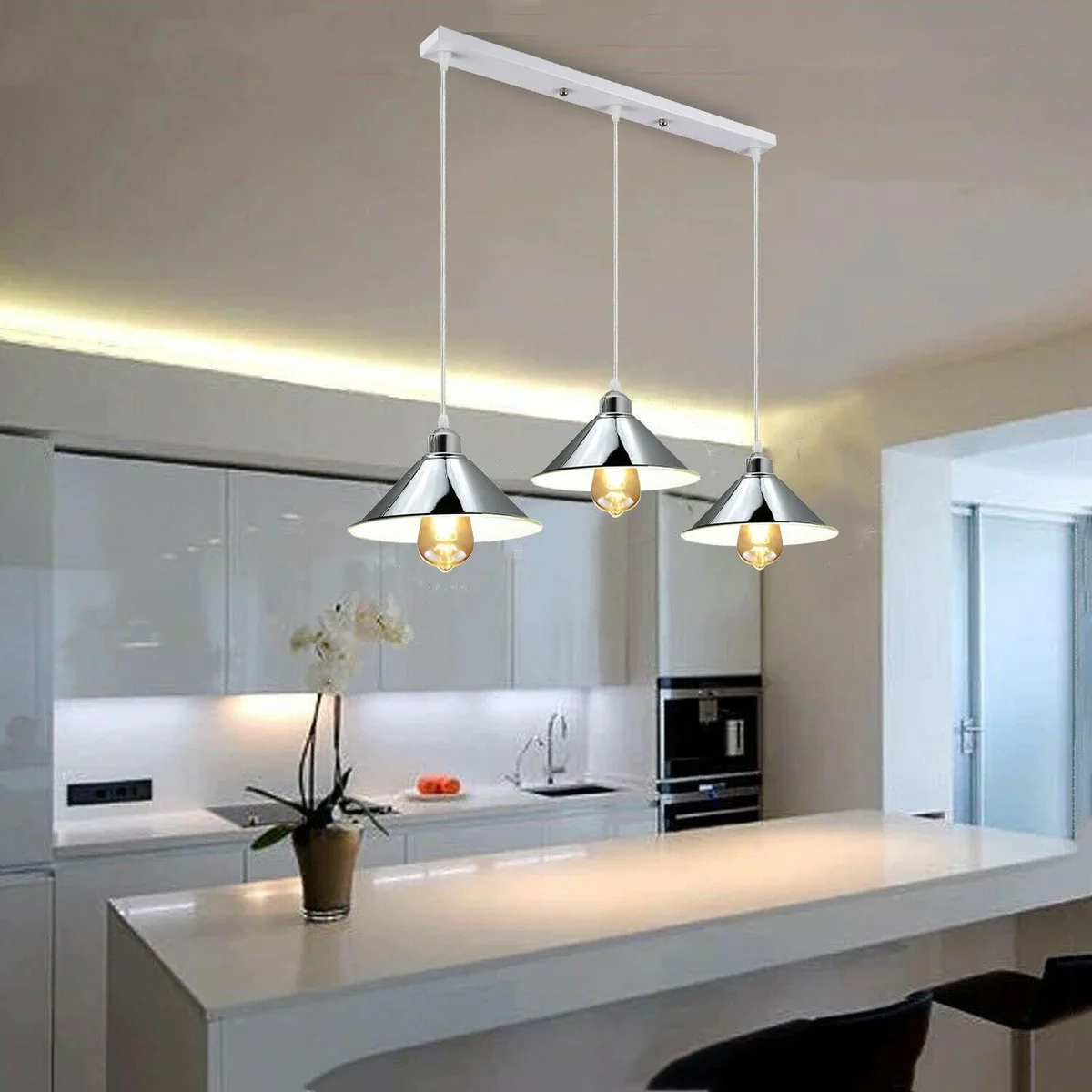 Modern industrial chrome pendant light with metal cone shade, hanging from ceiling, includes 3 socket holders and PVC cable
