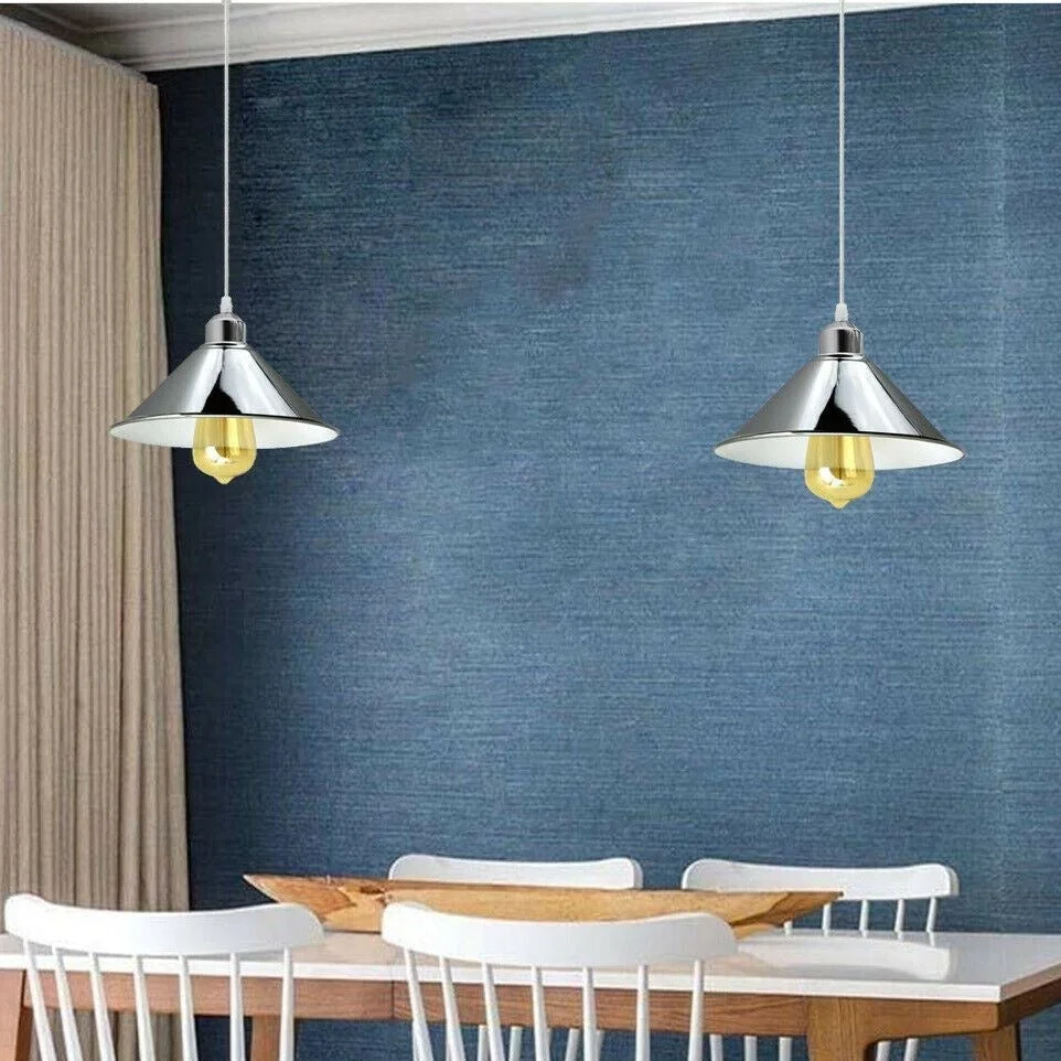Chrome ceiling pendant light with metal cone shade and clear PVC cable, hanging from ceiling, for bedroom or conservatory