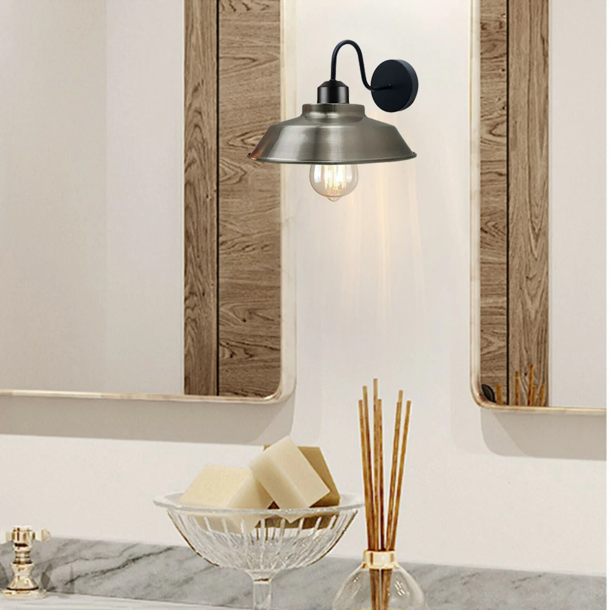 Adjustable gooseneck wall light with dome shade, brushed metal finish, industrial style, suitable for living or hallways