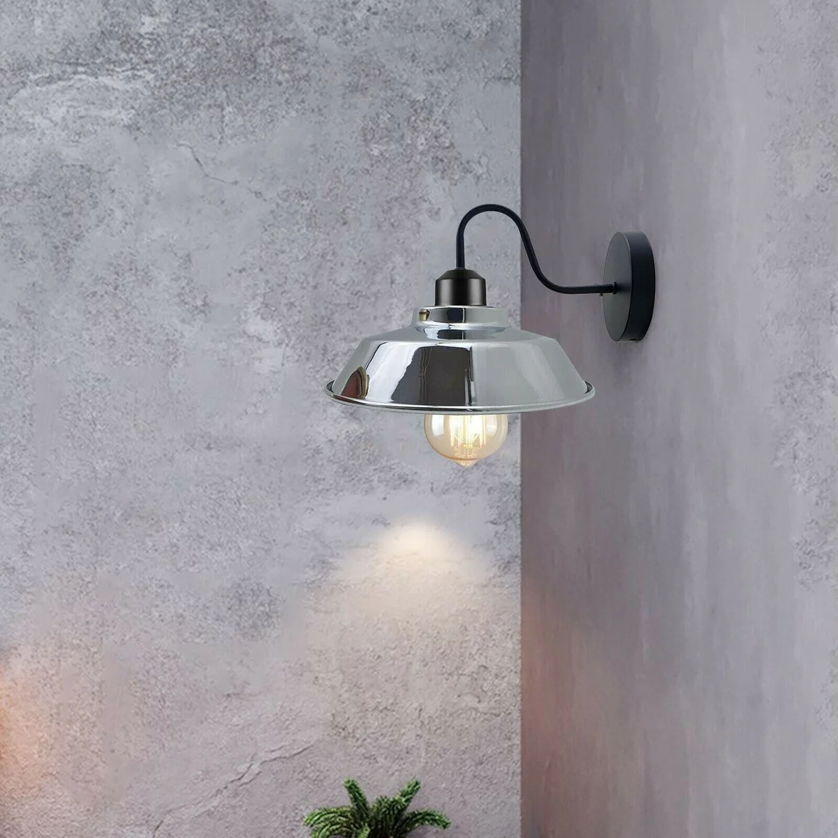 Rustic industrial gooseneck wall sconce with a black metal dome shade, showcasing a vintage dome shade sconce design.