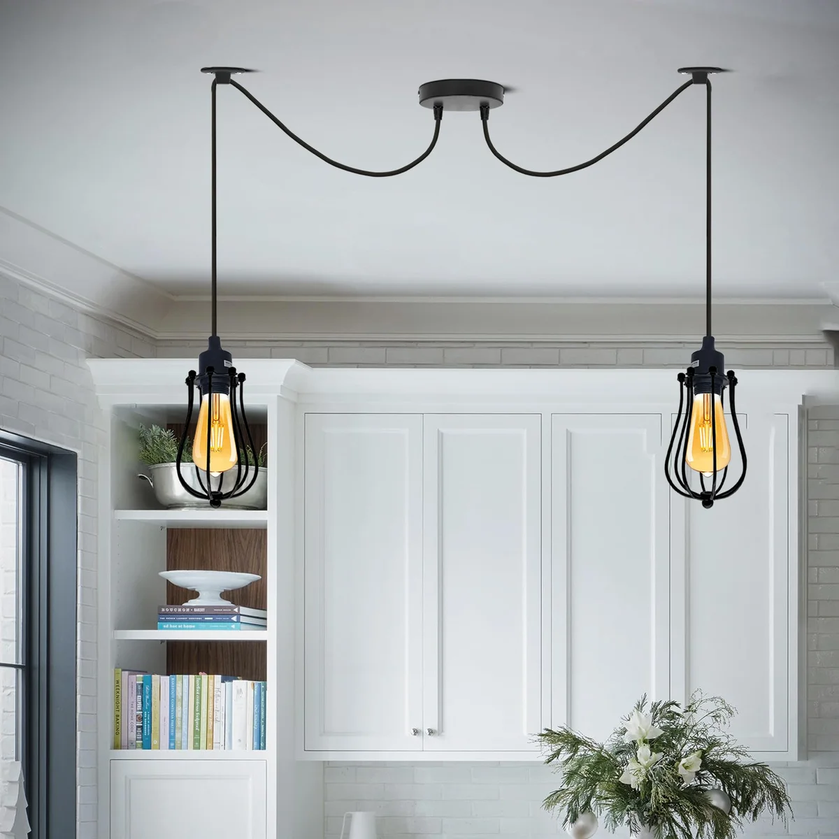 Black pendant light with spider‑shaped cluster of metal cages, 2 m drop, black powder‑coated finish.