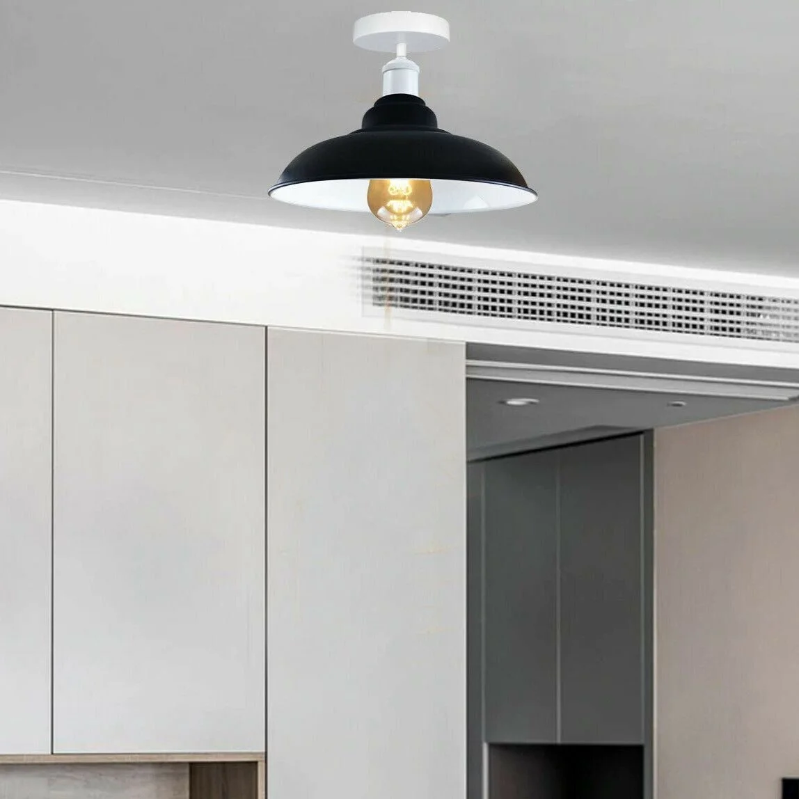 Metal ceiling light shade, black, 10cm x 2.5cm, with E27 base and bulb holder.
