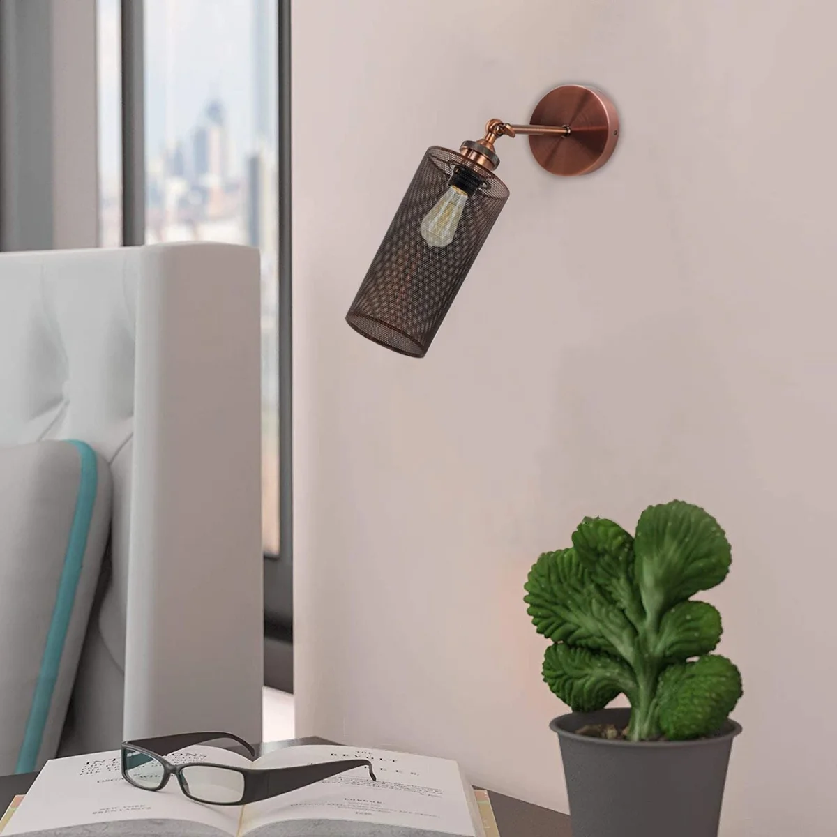 Black metal wall light with cylindrical shade, labeled E27 bulb wall light, dimmable, suitable for indoor wall mounting.