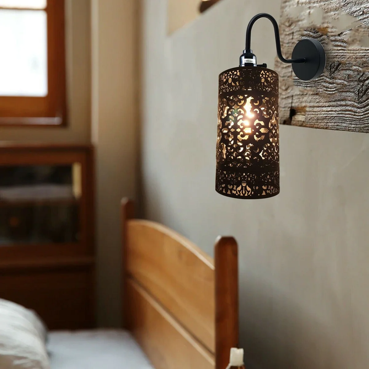 Black steel E27 wall sconce with adjustable swan neck arm, cylindrical drum-shaped metal shade, modern industrial design.