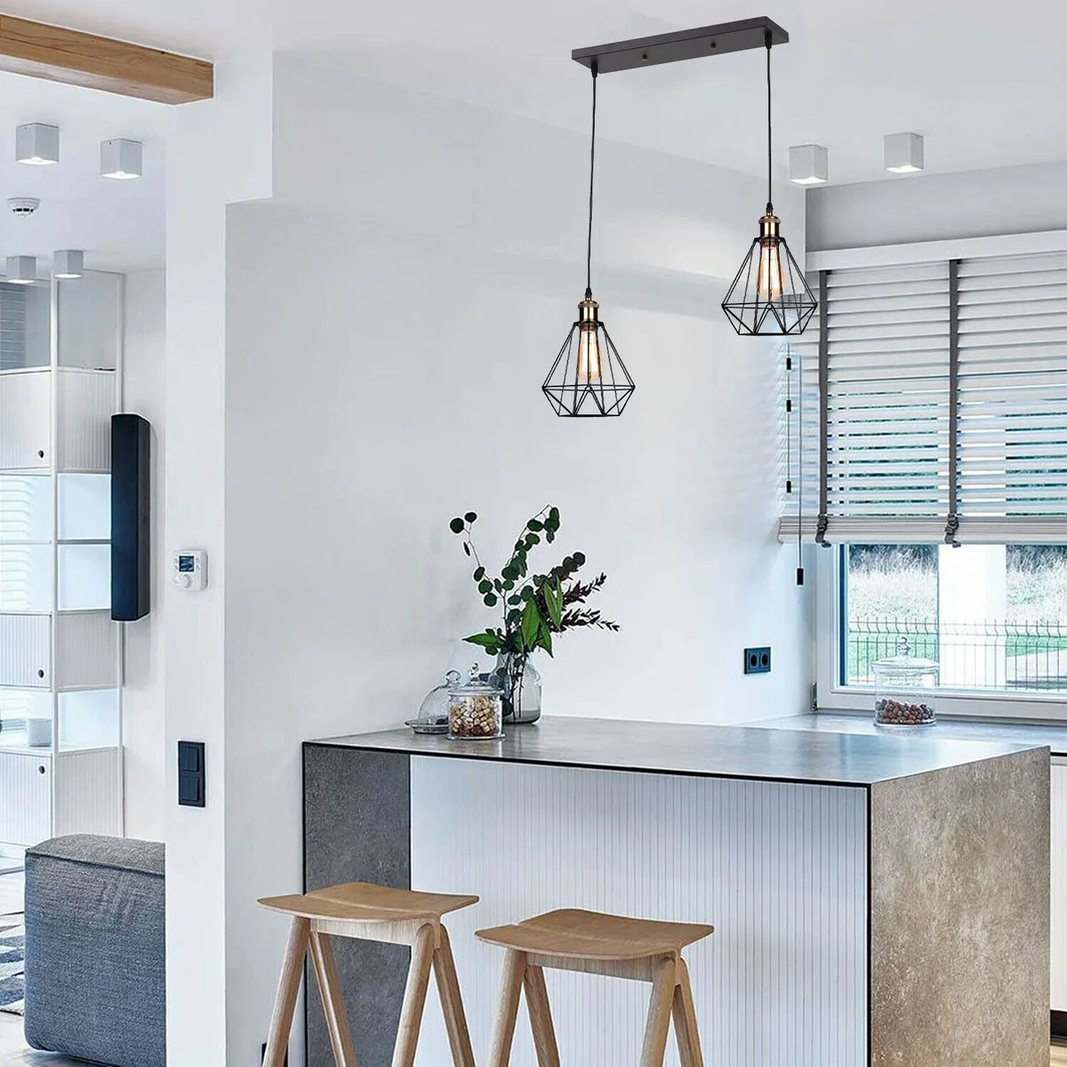 2 head black metal wire cage ceiling light with 95 cm PVC cable hanging from a 30 cm plate, featuring 2 E27 sockets.