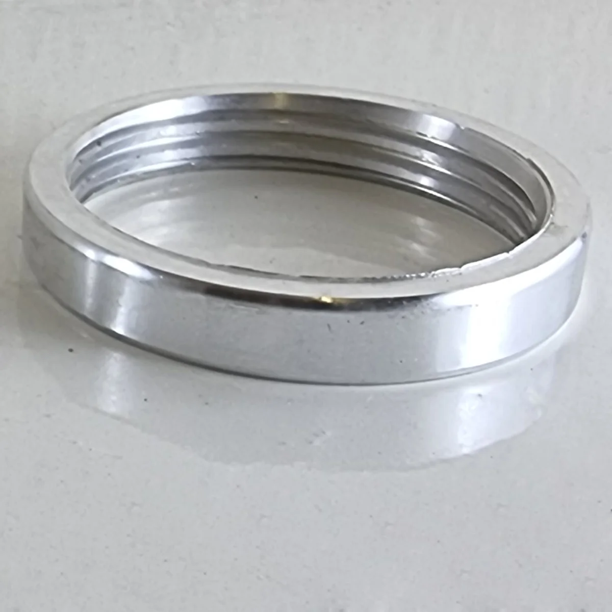 Satin nickel lamp ring in iron, 40mm inner diameter, 47mm outer, 8mm height, shown in a crisp product shot.