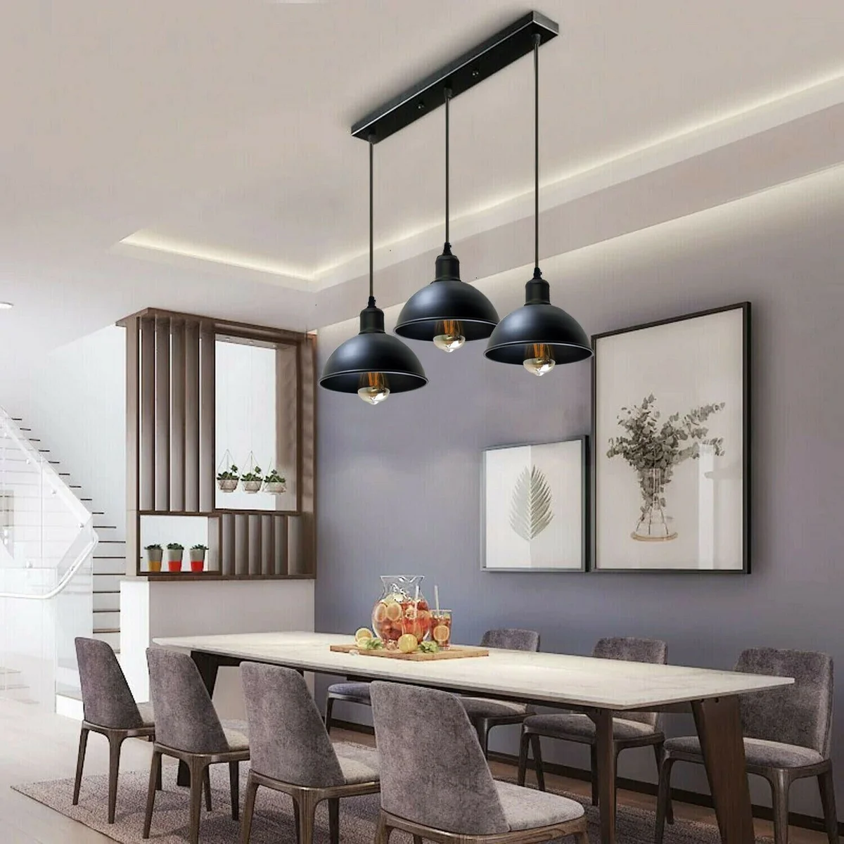 Black industrial ceiling pendant with three metal dome lamps and long PVC cable