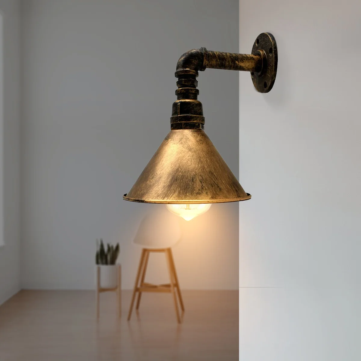 Steampunk wall light featuring a metal pipe‑style shade with a cone and black/brushed copper finish, wall‑mounted.