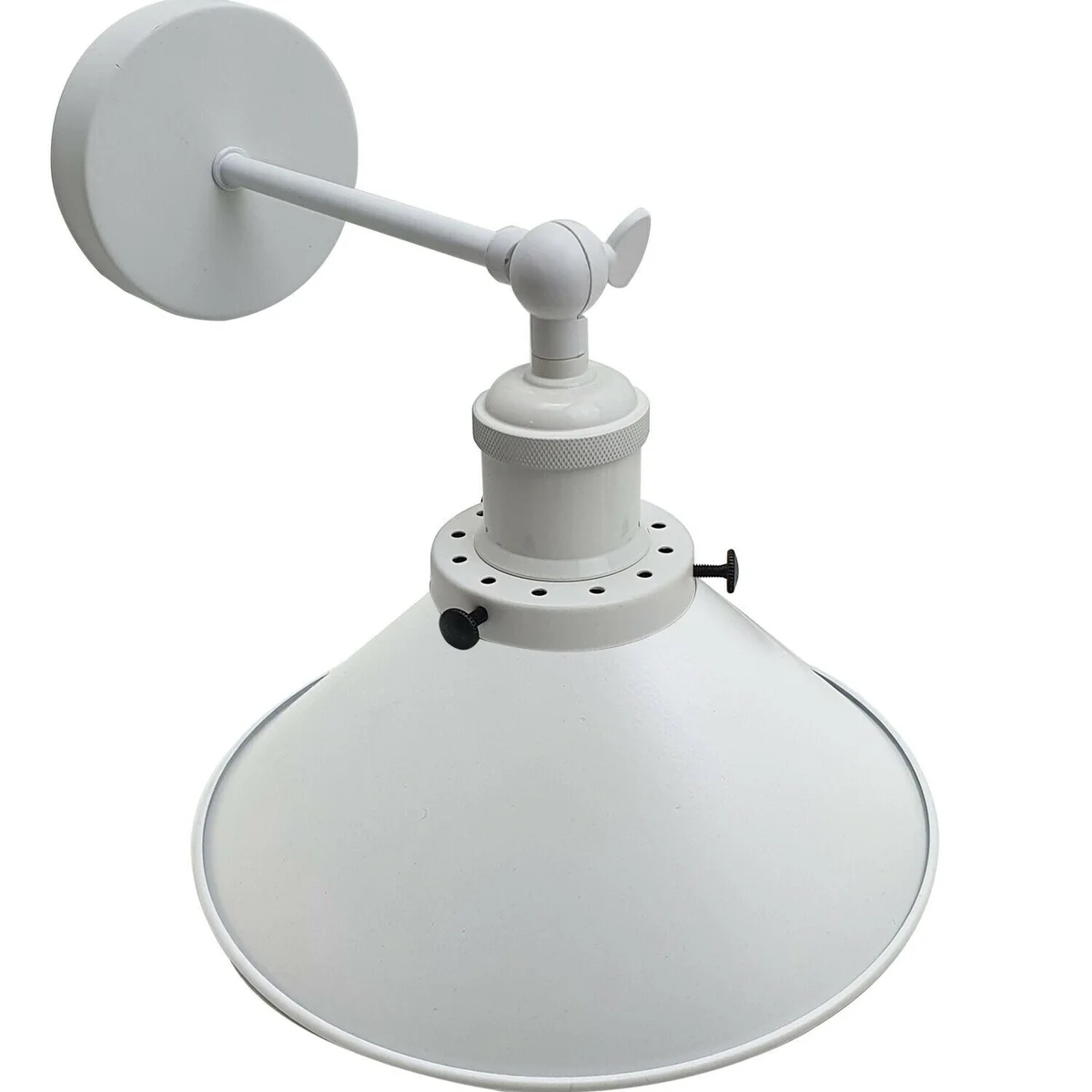 White plug‑in wall sconce with iron base, E27 holder and white lamp shade, mounted on wall in modern industrial décor.