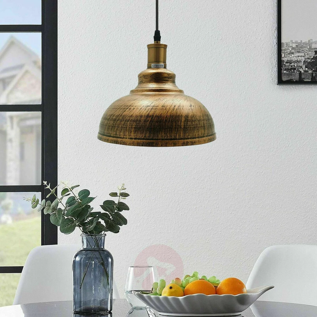 Modern metal dome lampshade light hanging from ceiling, with black metal frame and PVC wire cord, showcasing a sleek pendant lantern.