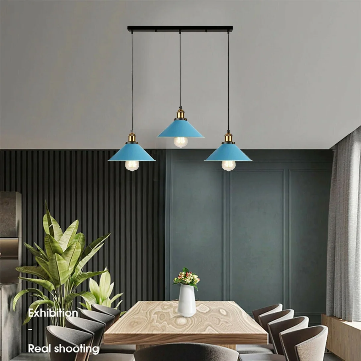 Vibrant 3‑light vintage pendant light with metal cone shades hanging from a ceiling rose, adjustable cords.