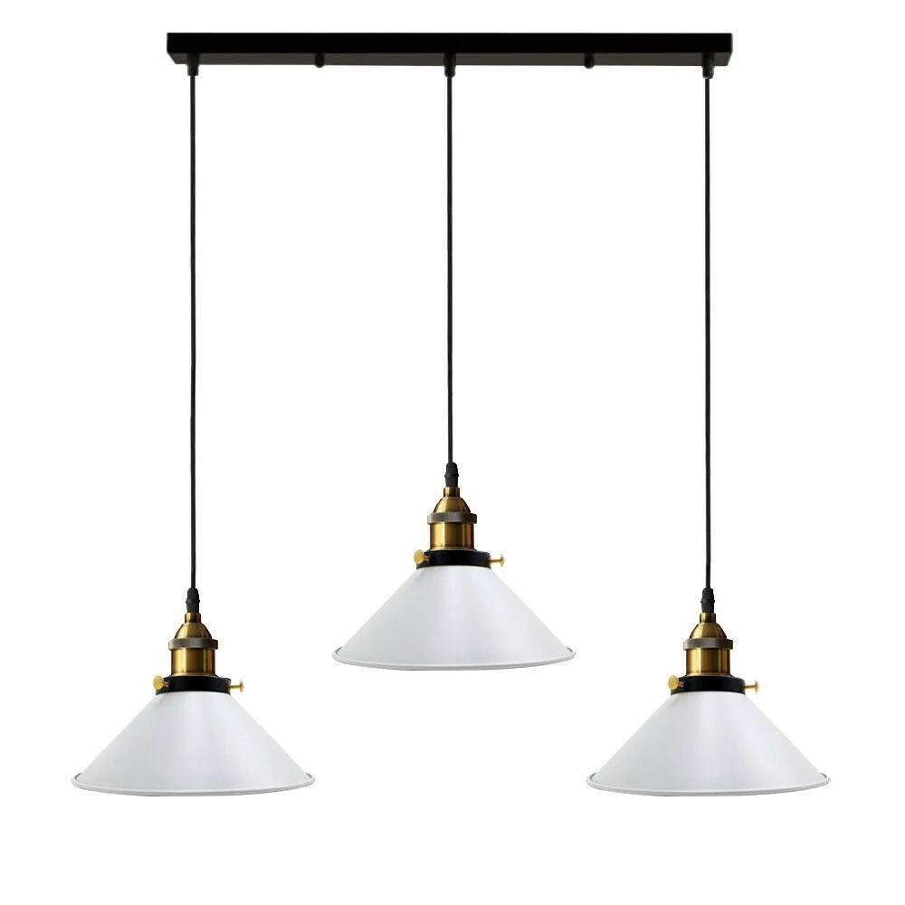 vintage pendant light with three black metal cone shades hanging from adjustable cords.