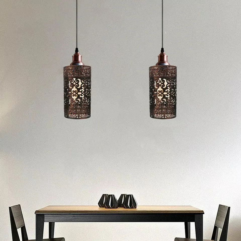 Adjustable cage pendant light with E27 base in rustic red metal shade hanging from ceiling
