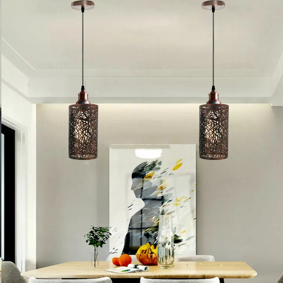Adjustable cage pendant light with metal cage, rustic red finish, E27 base hanging from ceiling, finished with PVC cable.