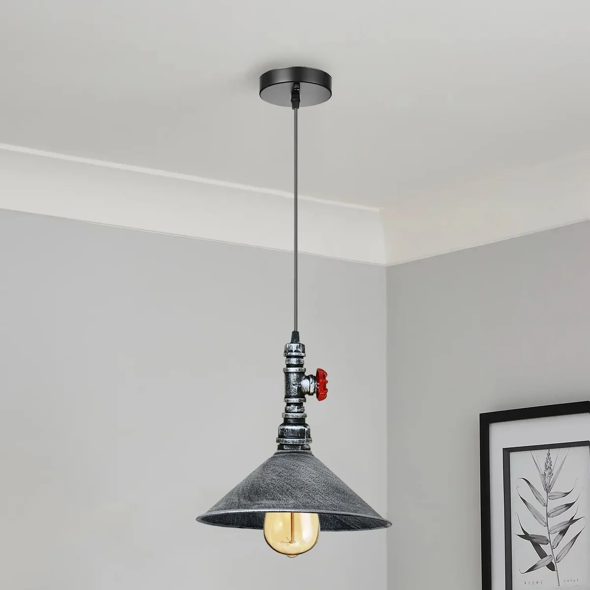 Steampunk pendant light with exposed pipe fittings, metal construction, cone lampshade, hanging from ceiling.