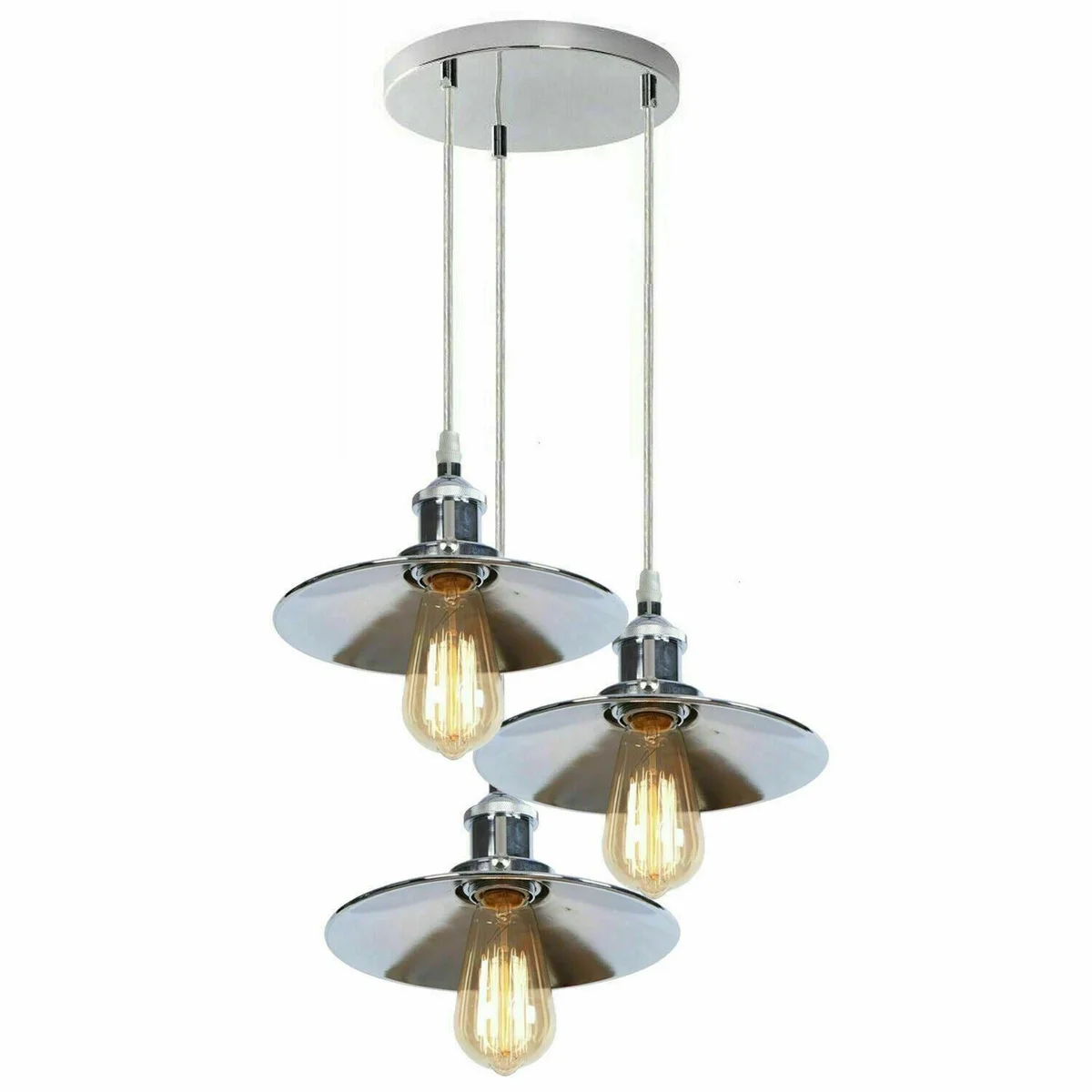 Three polished chrome pendant lights with flat shades hang over a kitchen island, a stylish contemporary ceiling light.